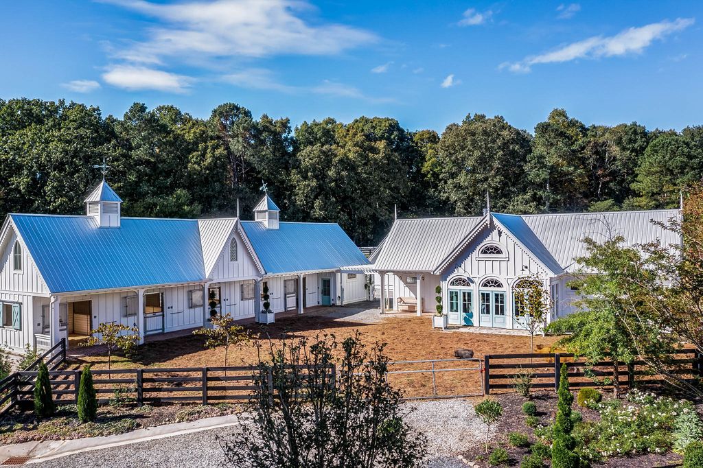 2860 Arbor Hill Road Home in Canton, Georgia. Situated on 40 acres of picturesque Southeast Canton countryside, Dara Hill Farm is a breathtaking 2019-built farmhouse estate that offers an unparalleled living experience. 