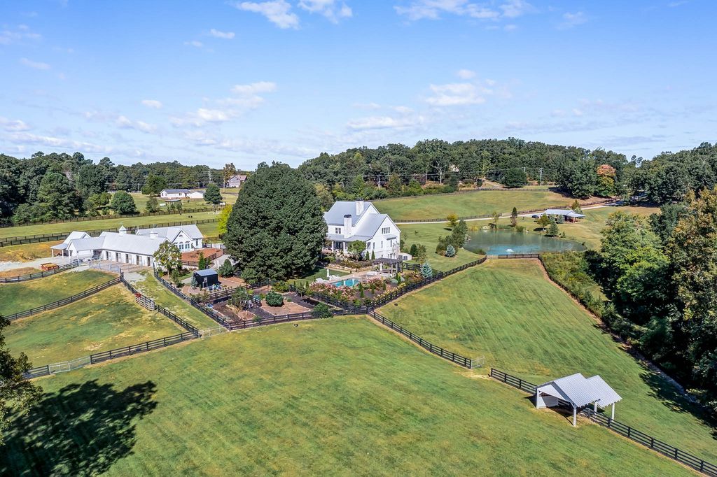 2860 Arbor Hill Road Home in Canton, Georgia. Situated on 40 acres of picturesque Southeast Canton countryside, Dara Hill Farm is a breathtaking 2019-built farmhouse estate that offers an unparalleled living experience. 