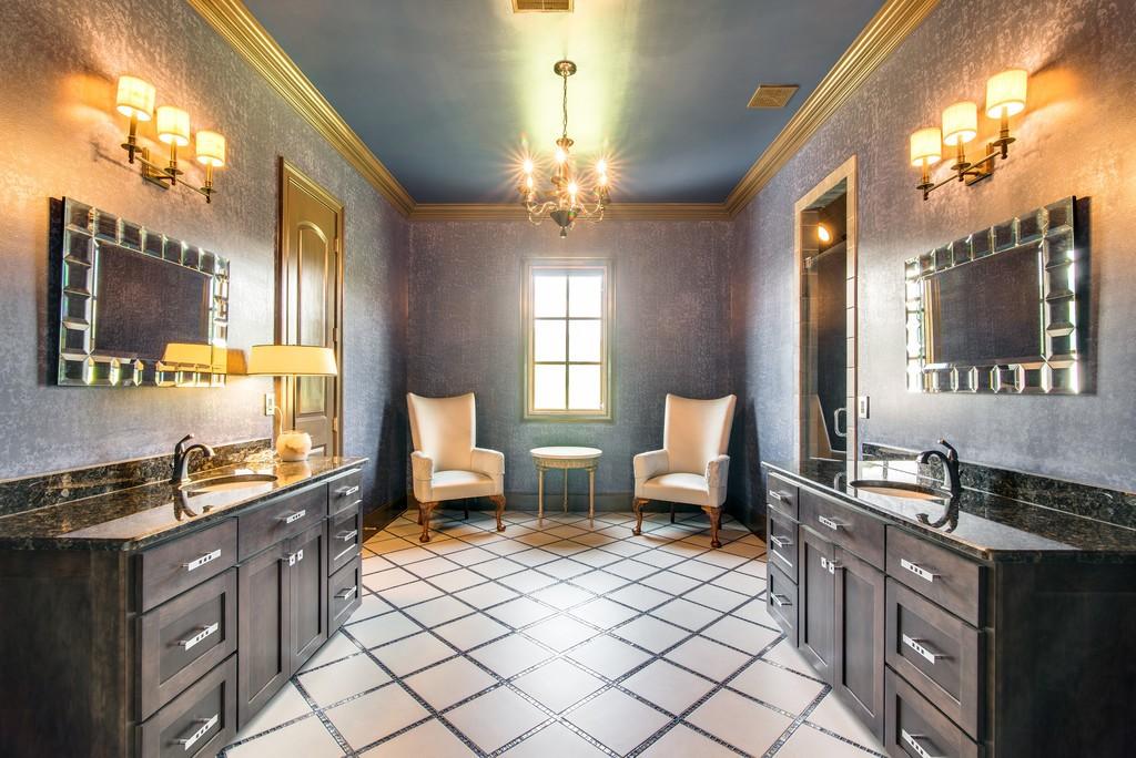 This stunning 20-acre gated estate is in the coveted and bucolic community of Leiper’s Fork in Williamson County. The grand entry features soaring 23-foot ceilings, marble floors and double sweeping staircases. It’s high drama teamed with luxurious beauty. The home has four bedrooms, six full and three half-baths. 3320 Southall Rd, Franklin, TN.