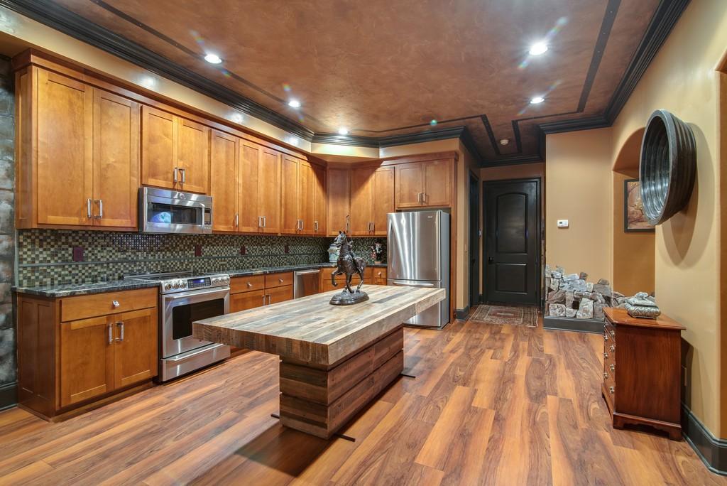 This stunning 20-acre gated estate is in the coveted and bucolic community of Leiper’s Fork in Williamson County. The grand entry features soaring 23-foot ceilings, marble floors and double sweeping staircases. It’s high drama teamed with luxurious beauty. The home has four bedrooms, six full and three half-baths. 3320 Southall Rd, Franklin, TN.
