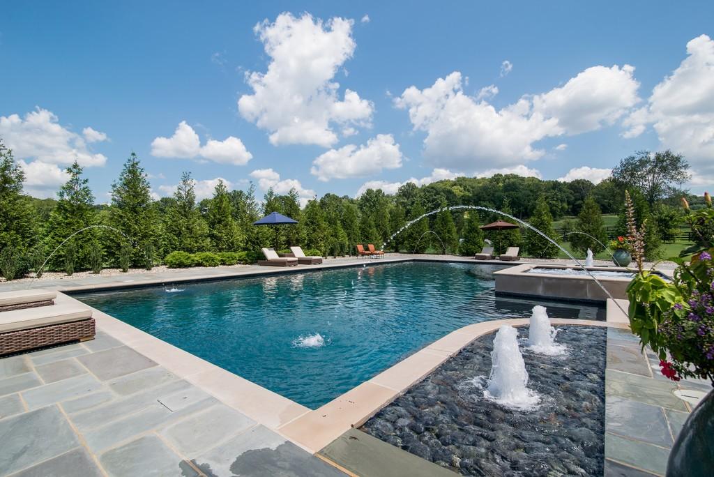 This stunning 20-acre gated estate is in the coveted and bucolic community of Leiper’s Fork in Williamson County. The grand entry features soaring 23-foot ceilings, marble floors and double sweeping staircases. It’s high drama teamed with luxurious beauty. The home has four bedrooms, six full and three half-baths. 3320 Southall Rd, Franklin, TN.