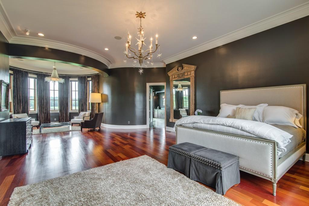This stunning 20-acre gated estate is in the coveted and bucolic community of Leiper’s Fork in Williamson County. The grand entry features soaring 23-foot ceilings, marble floors and double sweeping staircases. It’s high drama teamed with luxurious beauty. The home has four bedrooms, six full and three half-baths. 3320 Southall Rd, Franklin, TN.