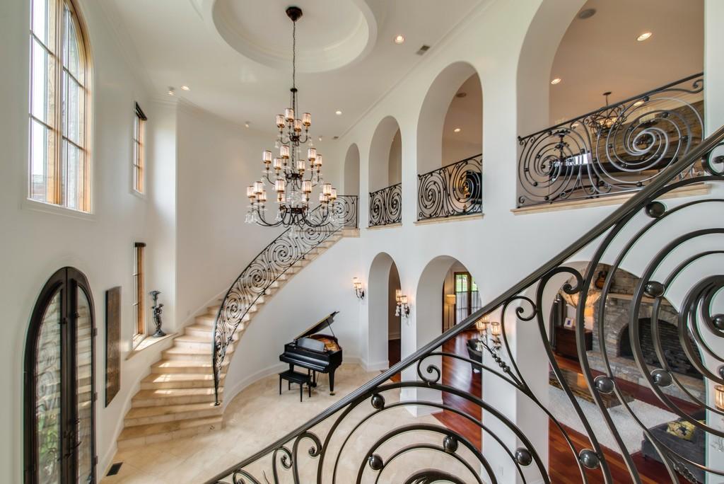 This stunning 20-acre gated estate is in the coveted and bucolic community of Leiper’s Fork in Williamson County. The grand entry features soaring 23-foot ceilings, marble floors and double sweeping staircases. It’s high drama teamed with luxurious beauty. The home has four bedrooms, six full and three half-baths. 3320 Southall Rd, Franklin, TN.