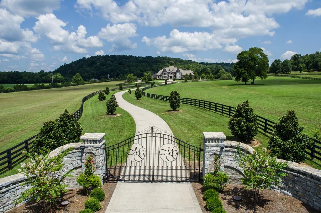 This stunning 20-acre gated estate is in the coveted and bucolic community of Leiper’s Fork in Williamson County. The grand entry features soaring 23-foot ceilings, marble floors and double sweeping staircases. It’s high drama teamed with luxurious beauty. The home has four bedrooms, six full and three half-baths. 3320 Southall Rd, Franklin, TN.