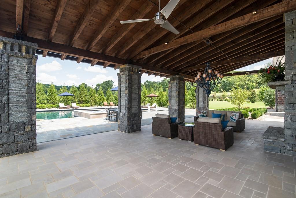 This stunning 20-acre gated estate is in the coveted and bucolic community of Leiper’s Fork in Williamson County. The grand entry features soaring 23-foot ceilings, marble floors and double sweeping staircases. It’s high drama teamed with luxurious beauty. The home has four bedrooms, six full and three half-baths. 3320 Southall Rd, Franklin, TN.
