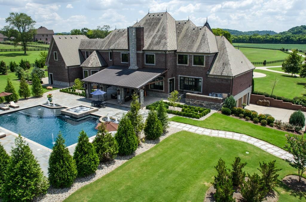 This stunning 20-acre gated estate is in the coveted and bucolic community of Leiper’s Fork in Williamson County. The grand entry features soaring 23-foot ceilings, marble floors and double sweeping staircases. It’s high drama teamed with luxurious beauty. The home has four bedrooms, six full and three half-baths. 3320 Southall Rd, Franklin, TN.