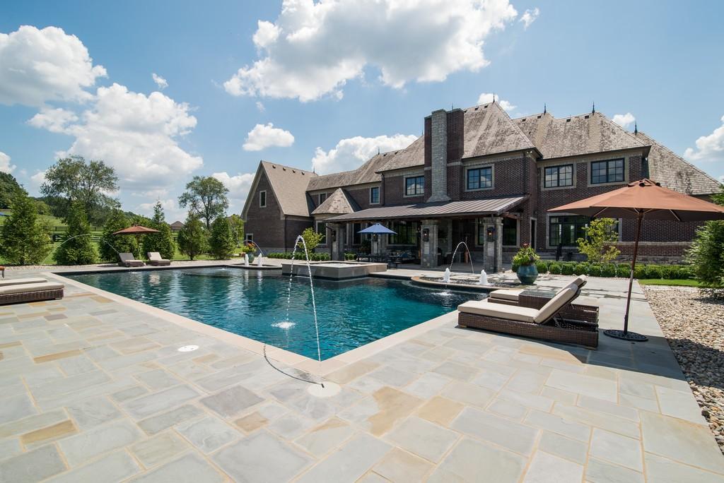 This stunning 20-acre gated estate is in the coveted and bucolic community of Leiper’s Fork in Williamson County. The grand entry features soaring 23-foot ceilings, marble floors and double sweeping staircases. It’s high drama teamed with luxurious beauty. The home has four bedrooms, six full and three half-baths. 3320 Southall Rd, Franklin, TN.