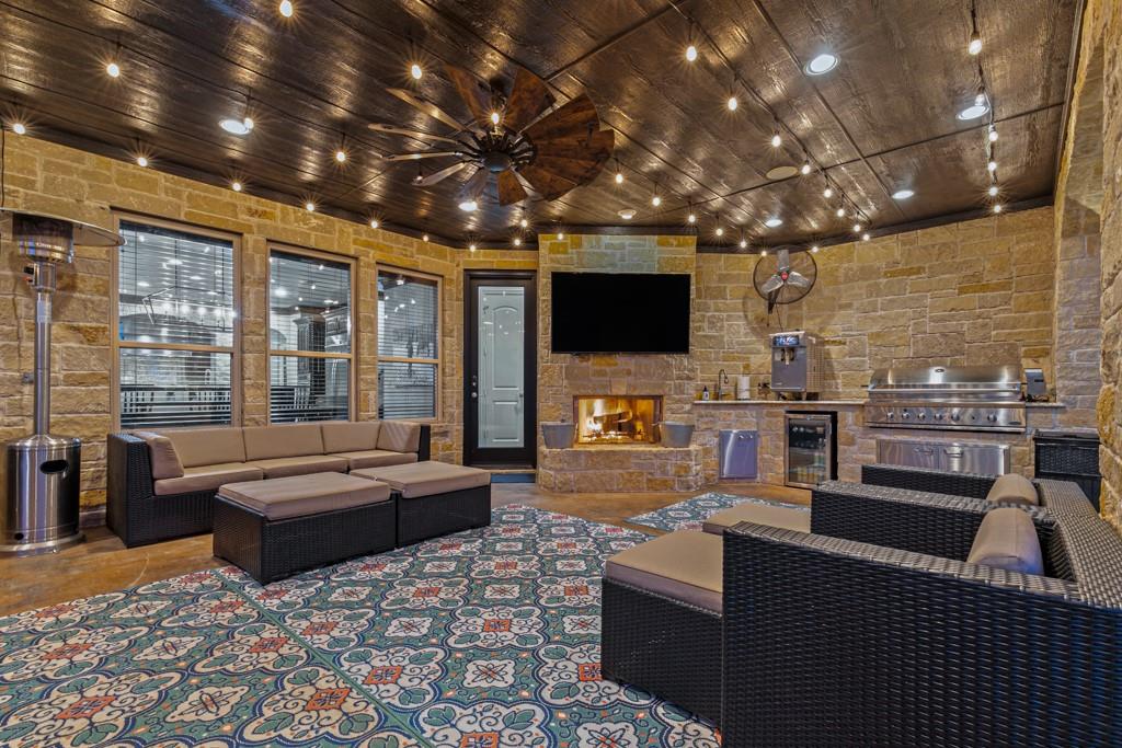 5297 South Farm 549 Home in Rockwall, Texas. Discover this exquisite 12.5-acre estate in Rockwall, boasting over 7100 sqft of luxury living space, 5 beds, 4.3 baths, and unparalleled amenities. Ideal for equestrian enthusiasts and car lovers alike, the property features a 3-stall horse barn, 5-car attached garages.