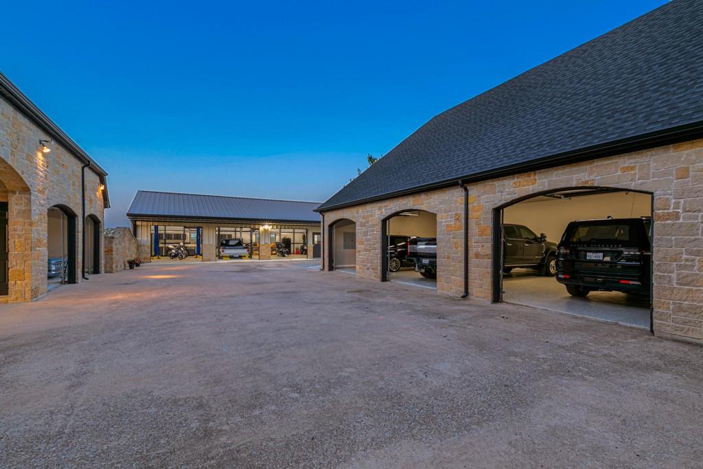 5297 South Farm 549 Home in Rockwall, Texas. Discover this exquisite 12.5-acre estate in Rockwall, boasting over 7100 sqft of luxury living space, 5 beds, 4.3 baths, and unparalleled amenities. Ideal for equestrian enthusiasts and car lovers alike, the property features a 3-stall horse barn, 5-car attached garages.