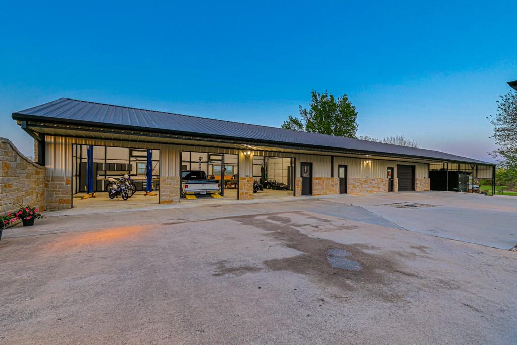 5297 South Farm 549 Home in Rockwall, Texas. Discover this exquisite 12.5-acre estate in Rockwall, boasting over 7100 sqft of luxury living space, 5 beds, 4.3 baths, and unparalleled amenities. Ideal for equestrian enthusiasts and car lovers alike, the property features a 3-stall horse barn, 5-car attached garages.