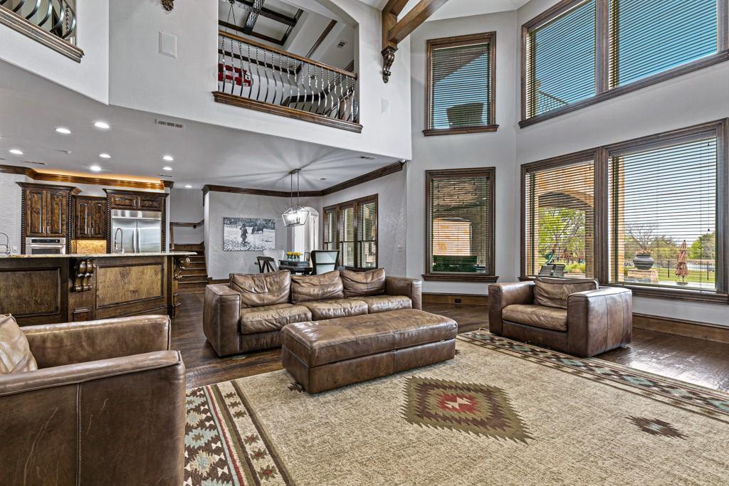 5297 South Farm 549 Home in Rockwall, Texas. Discover this exquisite 12.5-acre estate in Rockwall, boasting over 7100 sqft of luxury living space, 5 beds, 4.3 baths, and unparalleled amenities. Ideal for equestrian enthusiasts and car lovers alike, the property features a 3-stall horse barn, 5-car attached garages.
