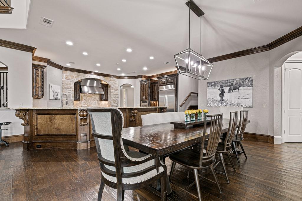 5297 South Farm 549 Home in Rockwall, Texas. Discover this exquisite 12.5-acre estate in Rockwall, boasting over 7100 sqft of luxury living space, 5 beds, 4.3 baths, and unparalleled amenities. Ideal for equestrian enthusiasts and car lovers alike, the property features a 3-stall horse barn, 5-car attached garages.