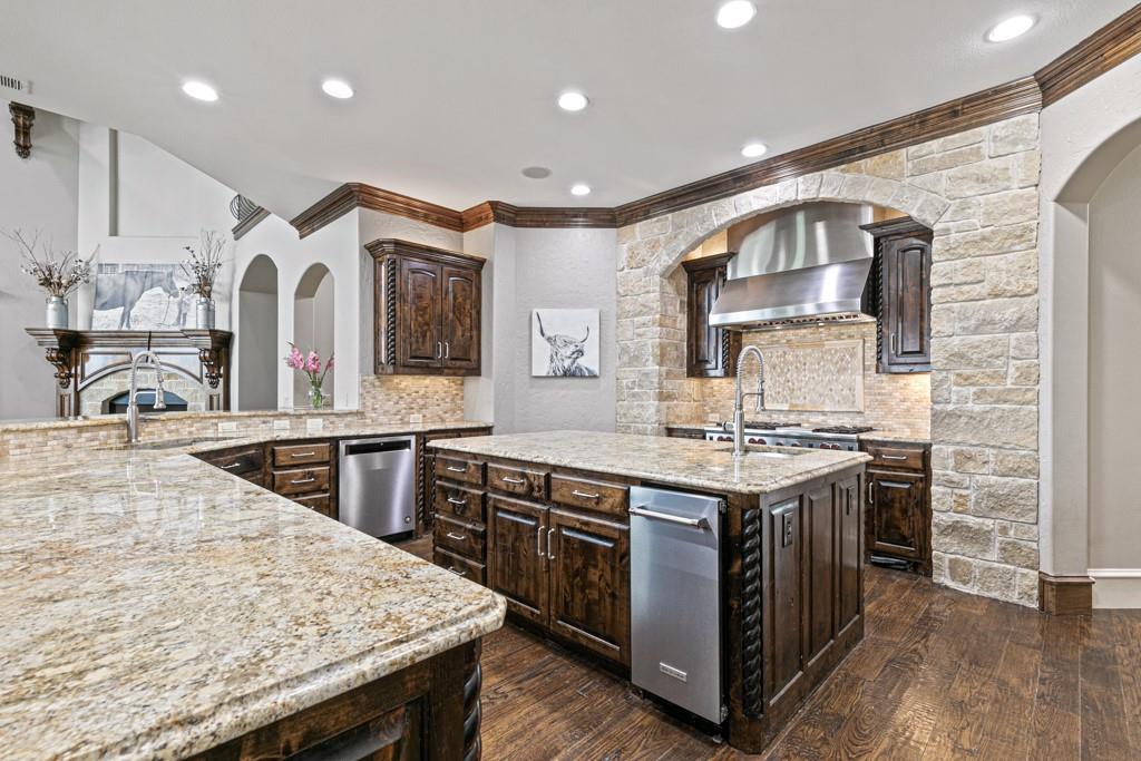 5297 South Farm 549 Home in Rockwall, Texas. Discover this exquisite 12.5-acre estate in Rockwall, boasting over 7100 sqft of luxury living space, 5 beds, 4.3 baths, and unparalleled amenities. Ideal for equestrian enthusiasts and car lovers alike, the property features a 3-stall horse barn, 5-car attached garages.