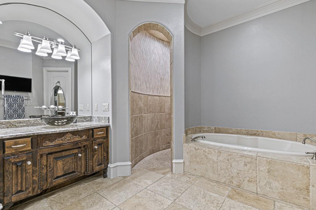 5297 South Farm 549 Home in Rockwall, Texas. Discover this exquisite 12.5-acre estate in Rockwall, boasting over 7100 sqft of luxury living space, 5 beds, 4.3 baths, and unparalleled amenities. Ideal for equestrian enthusiasts and car lovers alike, the property features a 3-stall horse barn, 5-car attached garages.