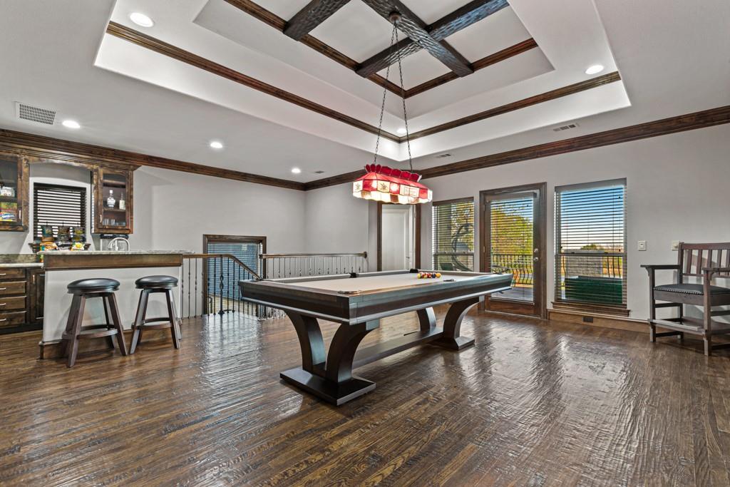 5297 South Farm 549 Home in Rockwall, Texas. Discover this exquisite 12.5-acre estate in Rockwall, boasting over 7100 sqft of luxury living space, 5 beds, 4.3 baths, and unparalleled amenities. Ideal for equestrian enthusiasts and car lovers alike, the property features a 3-stall horse barn, 5-car attached garages.