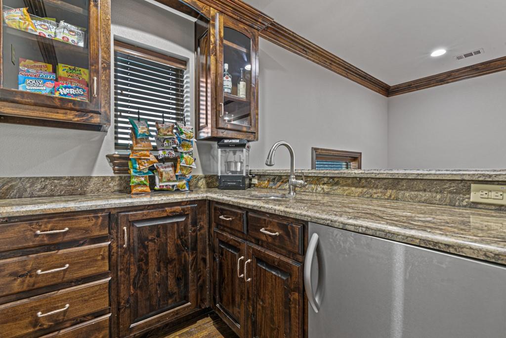 5297 South Farm 549 Home in Rockwall, Texas. Discover this exquisite 12.5-acre estate in Rockwall, boasting over 7100 sqft of luxury living space, 5 beds, 4.3 baths, and unparalleled amenities. Ideal for equestrian enthusiasts and car lovers alike, the property features a 3-stall horse barn, 5-car attached garages.