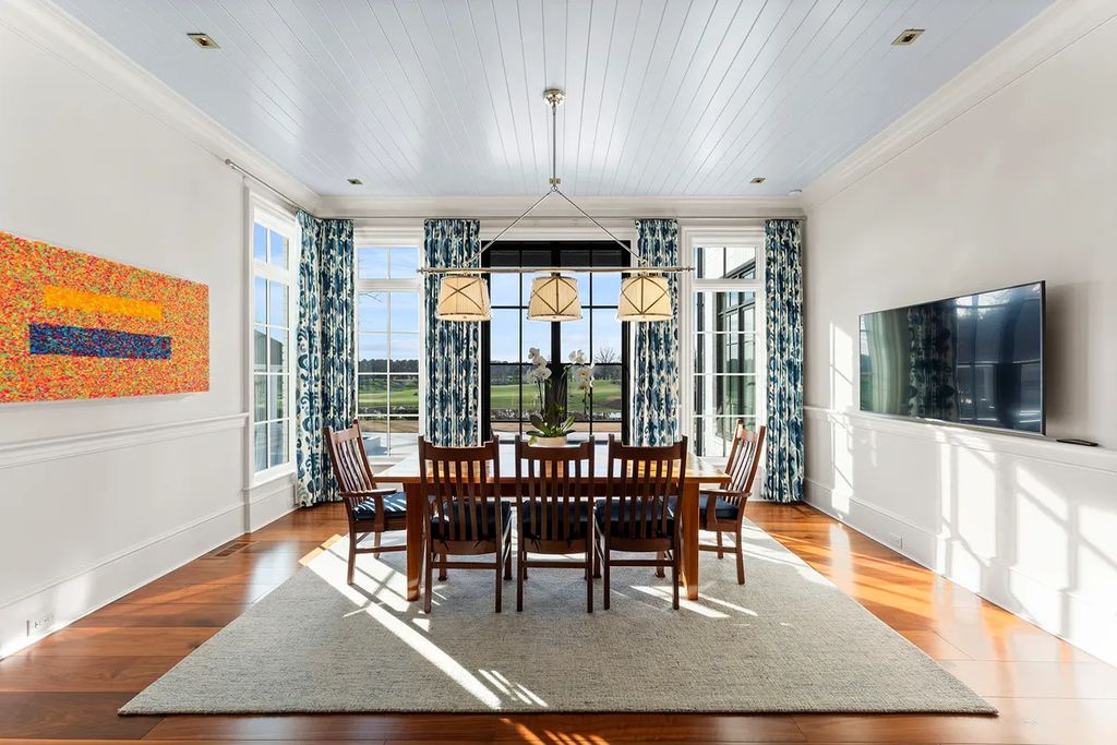 7214 Baltusrol Lane Home in Charlotte, North Carolina. Discover unparalleled luxury living at "Satisfaction In Charlotte," a meticulously renovated estate offering breathtaking views of Quail Hollow's premier golf course. This turn-key home boasts top-to-bottom renovations by Peters Custom Homes, including a culinary masterpiece kitchen, indulgent primary suite with private balcony, and seamless indoor-outdoor living spaces perfect for entertaining.