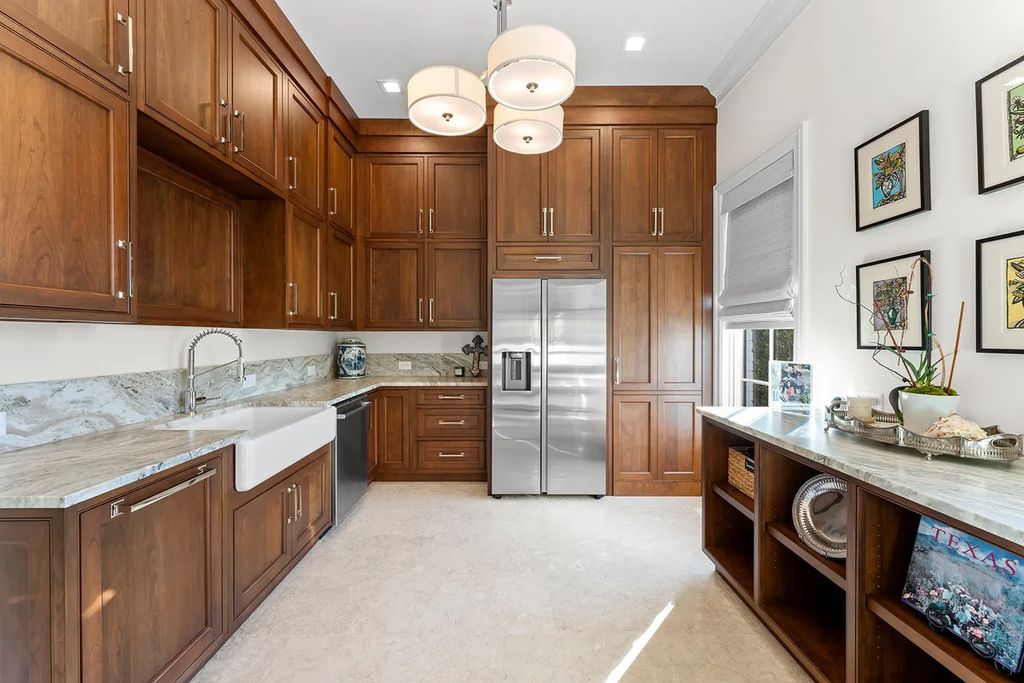 7214 Baltusrol Lane Home in Charlotte, North Carolina. Discover unparalleled luxury living at "Satisfaction In Charlotte," a meticulously renovated estate offering breathtaking views of Quail Hollow's premier golf course. This turn-key home boasts top-to-bottom renovations by Peters Custom Homes, including a culinary masterpiece kitchen, indulgent primary suite with private balcony, and seamless indoor-outdoor living spaces perfect for entertaining.