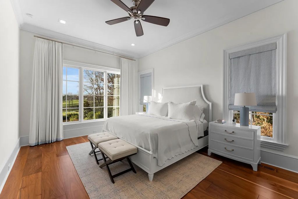 7214 Baltusrol Lane Home in Charlotte, North Carolina. Discover unparalleled luxury living at "Satisfaction In Charlotte," a meticulously renovated estate offering breathtaking views of Quail Hollow's premier golf course. This turn-key home boasts top-to-bottom renovations by Peters Custom Homes, including a culinary masterpiece kitchen, indulgent primary suite with private balcony, and seamless indoor-outdoor living spaces perfect for entertaining.