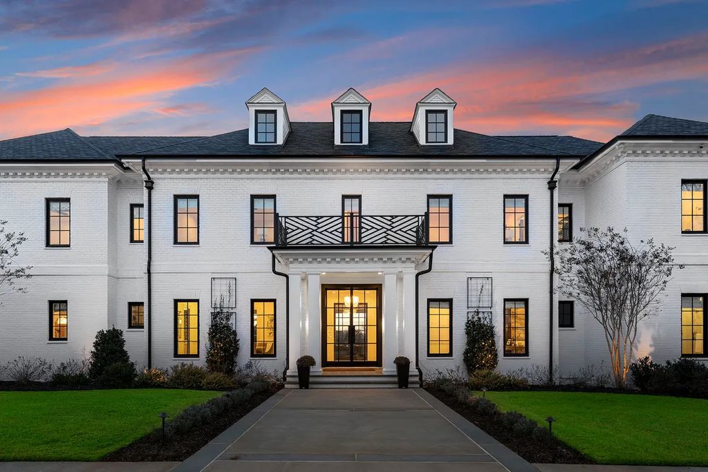 7214 Baltusrol Lane Home in Charlotte, North Carolina. Discover unparalleled luxury living at "Satisfaction In Charlotte," a meticulously renovated estate offering breathtaking views of Quail Hollow's premier golf course. This turn-key home boasts top-to-bottom renovations by Peters Custom Homes, including a culinary masterpiece kitchen, indulgent primary suite with private balcony, and seamless indoor-outdoor living spaces perfect for entertaining.