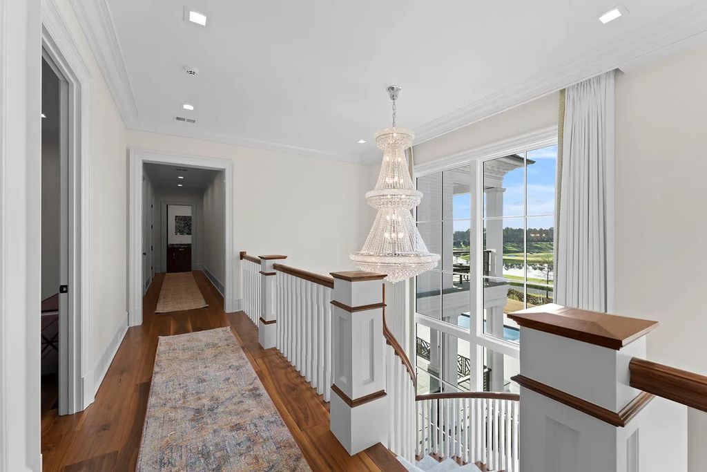 7214 Baltusrol Lane Home in Charlotte, North Carolina. Discover unparalleled luxury living at "Satisfaction In Charlotte," a meticulously renovated estate offering breathtaking views of Quail Hollow's premier golf course. This turn-key home boasts top-to-bottom renovations by Peters Custom Homes, including a culinary masterpiece kitchen, indulgent primary suite with private balcony, and seamless indoor-outdoor living spaces perfect for entertaining.