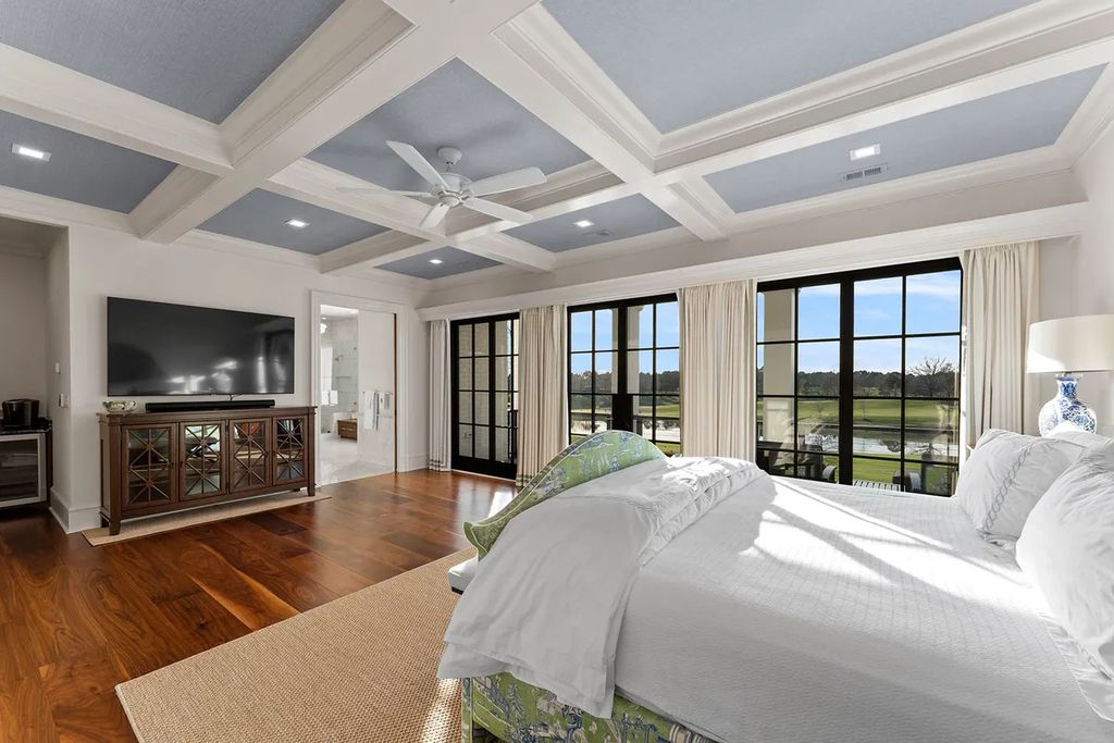 7214 Baltusrol Lane Home in Charlotte, North Carolina. Discover unparalleled luxury living at "Satisfaction In Charlotte," a meticulously renovated estate offering breathtaking views of Quail Hollow's premier golf course. This turn-key home boasts top-to-bottom renovations by Peters Custom Homes, including a culinary masterpiece kitchen, indulgent primary suite with private balcony, and seamless indoor-outdoor living spaces perfect for entertaining.