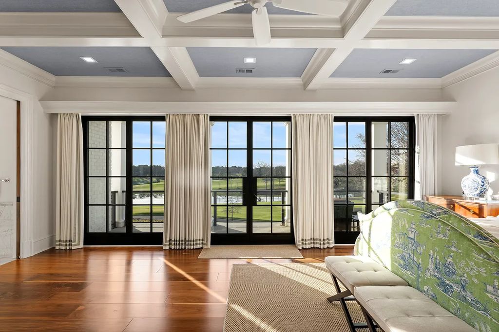7214 Baltusrol Lane Home in Charlotte, North Carolina. Discover unparalleled luxury living at "Satisfaction In Charlotte," a meticulously renovated estate offering breathtaking views of Quail Hollow's premier golf course. This turn-key home boasts top-to-bottom renovations by Peters Custom Homes, including a culinary masterpiece kitchen, indulgent primary suite with private balcony, and seamless indoor-outdoor living spaces perfect for entertaining.