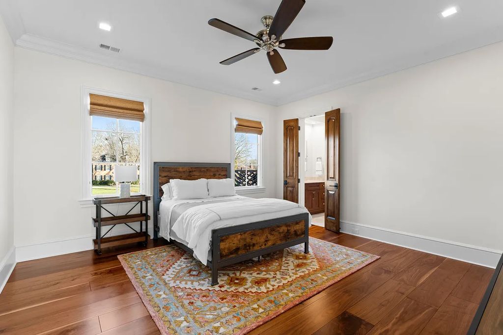 7214 Baltusrol Lane Home in Charlotte, North Carolina. Discover unparalleled luxury living at "Satisfaction In Charlotte," a meticulously renovated estate offering breathtaking views of Quail Hollow's premier golf course. This turn-key home boasts top-to-bottom renovations by Peters Custom Homes, including a culinary masterpiece kitchen, indulgent primary suite with private balcony, and seamless indoor-outdoor living spaces perfect for entertaining.
