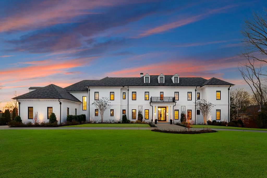 7214 Baltusrol Lane Home in Charlotte, North Carolina. Discover unparalleled luxury living at "Satisfaction In Charlotte," a meticulously renovated estate offering breathtaking views of Quail Hollow's premier golf course. This turn-key home boasts top-to-bottom renovations by Peters Custom Homes, including a culinary masterpiece kitchen, indulgent primary suite with private balcony, and seamless indoor-outdoor living spaces perfect for entertaining.