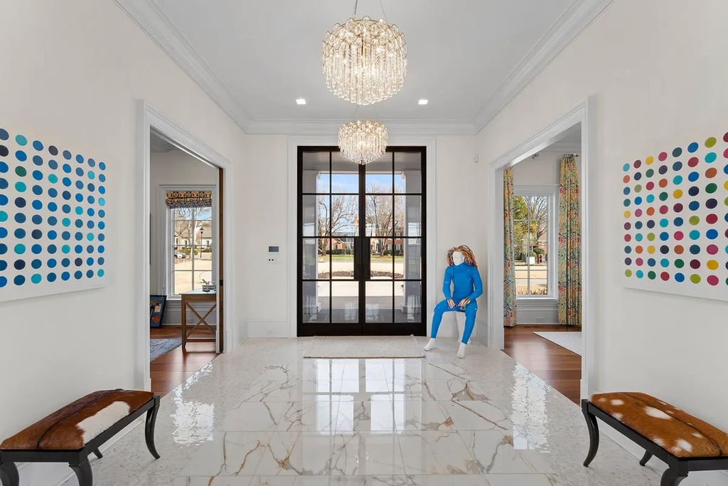 7214 Baltusrol Lane Home in Charlotte, North Carolina. Discover unparalleled luxury living at "Satisfaction In Charlotte," a meticulously renovated estate offering breathtaking views of Quail Hollow's premier golf course. This turn-key home boasts top-to-bottom renovations by Peters Custom Homes, including a culinary masterpiece kitchen, indulgent primary suite with private balcony, and seamless indoor-outdoor living spaces perfect for entertaining.