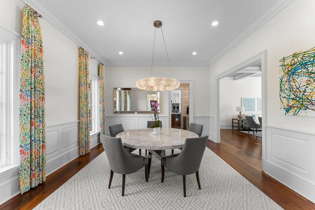 7214 Baltusrol Lane Home in Charlotte, North Carolina. Discover unparalleled luxury living at "Satisfaction In Charlotte," a meticulously renovated estate offering breathtaking views of Quail Hollow's premier golf course. This turn-key home boasts top-to-bottom renovations by Peters Custom Homes, including a culinary masterpiece kitchen, indulgent primary suite with private balcony, and seamless indoor-outdoor living spaces perfect for entertaining.