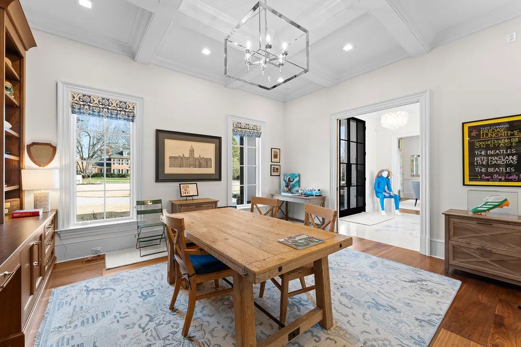 7214 Baltusrol Lane Home in Charlotte, North Carolina. Discover unparalleled luxury living at "Satisfaction In Charlotte," a meticulously renovated estate offering breathtaking views of Quail Hollow's premier golf course. This turn-key home boasts top-to-bottom renovations by Peters Custom Homes, including a culinary masterpiece kitchen, indulgent primary suite with private balcony, and seamless indoor-outdoor living spaces perfect for entertaining.