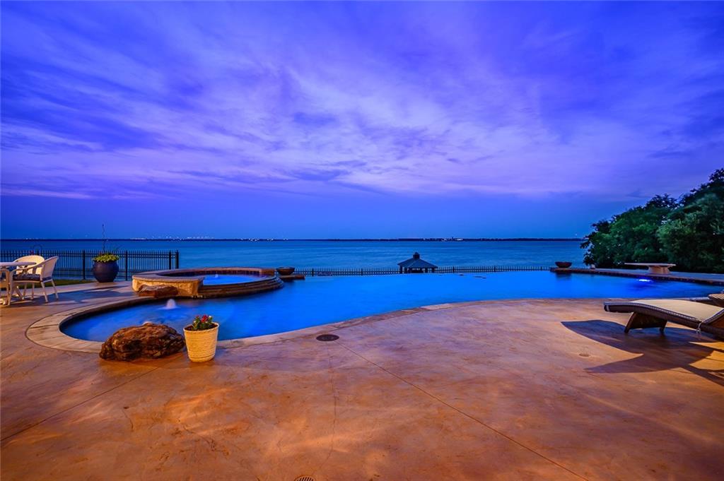 916 Cedar Shores Drive Home in Heath, Texas. Explore the epitome of luxury at Sunset Shores, a stunning estate situated on a picturesque 1.5-acre waterfront lot on Lake Ray Hubbard.