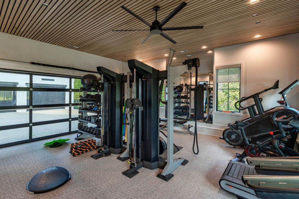 9252 Lehigh Drive Home in Brentwood, Tennessee. Step into luxury living at its finest with this stunning transitional home nestled on a private 3.5-acre lot in Brentwood. Enjoy breathtaking views of the surrounding hillsides from every angle, complemented by Marie-Joe Bouffard’s captivating interior design. 