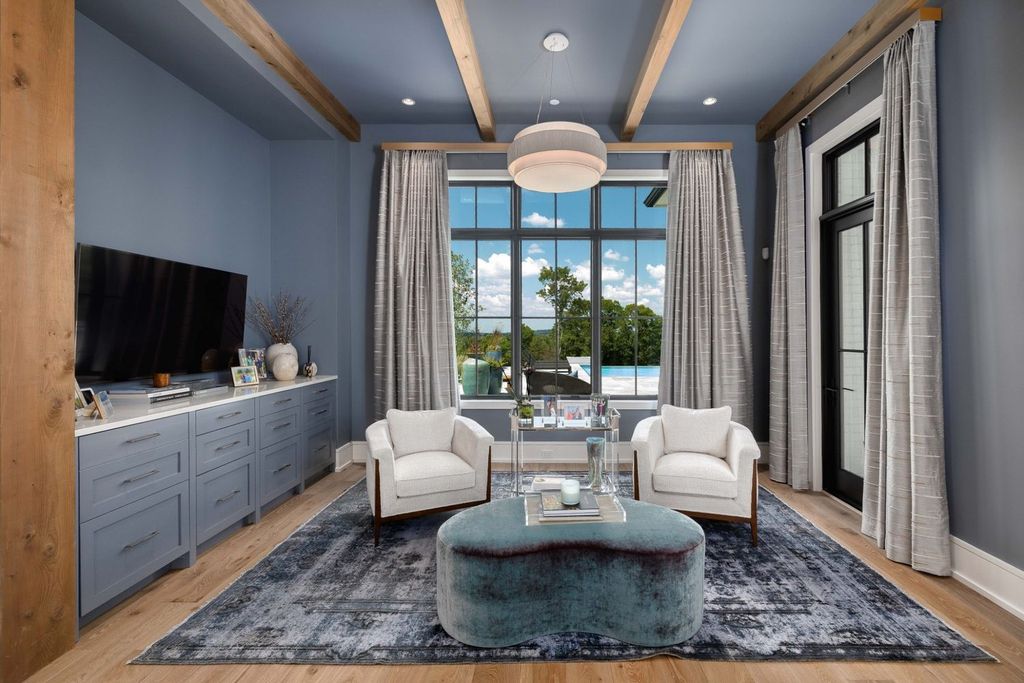 9252 Lehigh Drive Home in Brentwood, Tennessee. Step into luxury living at its finest with this stunning transitional home nestled on a private 3.5-acre lot in Brentwood. Enjoy breathtaking views of the surrounding hillsides from every angle, complemented by Marie-Joe Bouffard’s captivating interior design. 