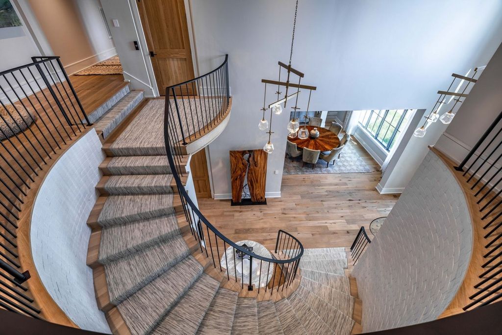 9252 Lehigh Drive Home in Brentwood, Tennessee. Step into luxury living at its finest with this stunning transitional home nestled on a private 3.5-acre lot in Brentwood. Enjoy breathtaking views of the surrounding hillsides from every angle, complemented by Marie-Joe Bouffard’s captivating interior design. 