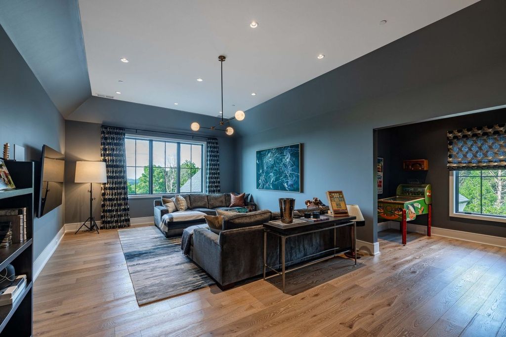 9252 Lehigh Drive Home in Brentwood, Tennessee. Step into luxury living at its finest with this stunning transitional home nestled on a private 3.5-acre lot in Brentwood. Enjoy breathtaking views of the surrounding hillsides from every angle, complemented by Marie-Joe Bouffard’s captivating interior design. 