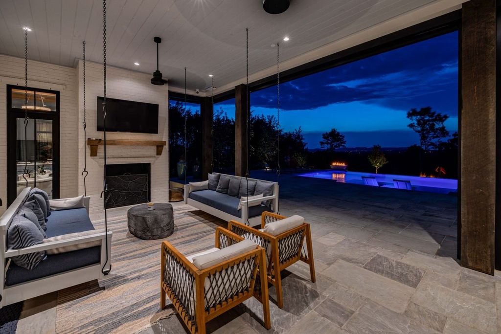 9252 Lehigh Drive Home in Brentwood, Tennessee. Step into luxury living at its finest with this stunning transitional home nestled on a private 3.5-acre lot in Brentwood. Enjoy breathtaking views of the surrounding hillsides from every angle, complemented by Marie-Joe Bouffard’s captivating interior design. 
