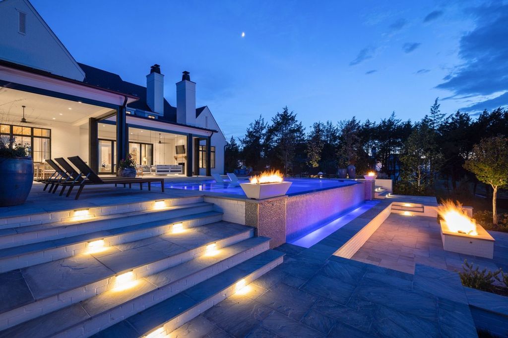 9252 Lehigh Drive Home in Brentwood, Tennessee. Step into luxury living at its finest with this stunning transitional home nestled on a private 3.5-acre lot in Brentwood. Enjoy breathtaking views of the surrounding hillsides from every angle, complemented by Marie-Joe Bouffard’s captivating interior design. 