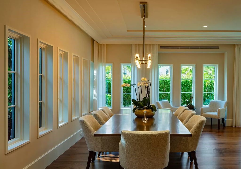 Discover luxury living at 323 Chilean Avenue, an impeccably re-imagined masterpiece in the tranquil heart of Palm Beach Town.