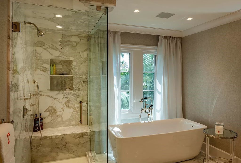 Discover luxury living at 323 Chilean Avenue, an impeccably re-imagined masterpiece in the tranquil heart of Palm Beach Town.
