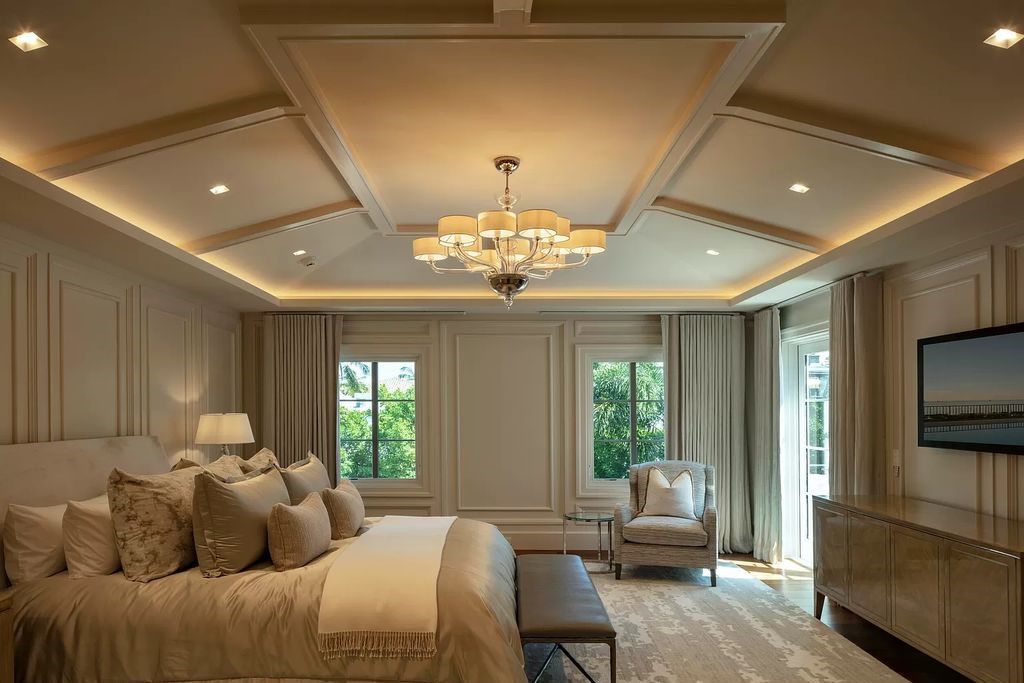 Discover luxury living at 323 Chilean Avenue, an impeccably re-imagined masterpiece in the tranquil heart of Palm Beach Town.