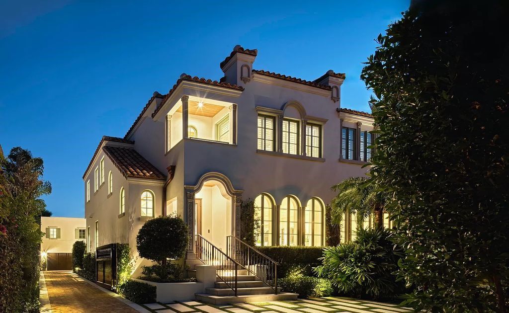 Discover luxury living at 323 Chilean Avenue, an impeccably re-imagined masterpiece in the tranquil heart of Palm Beach Town.