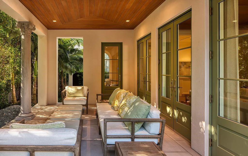 Discover luxury living at 323 Chilean Avenue, an impeccably re-imagined masterpiece in the tranquil heart of Palm Beach Town.