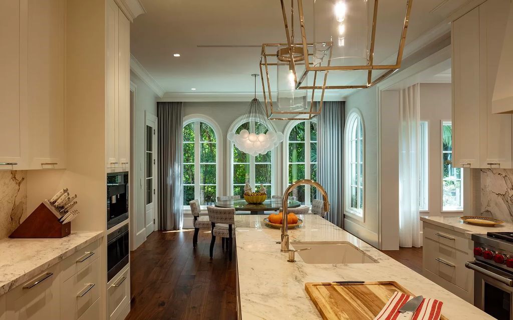Discover luxury living at 323 Chilean Avenue, an impeccably re-imagined masterpiece in the tranquil heart of Palm Beach Town.