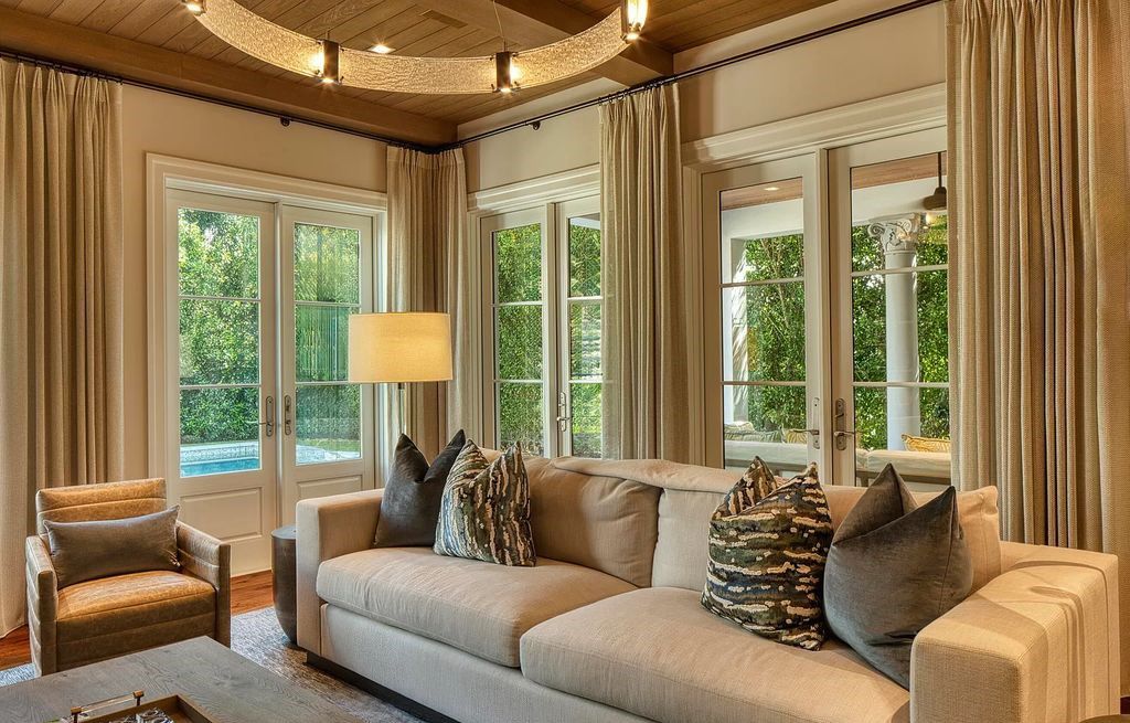 Discover luxury living at 323 Chilean Avenue, an impeccably re-imagined masterpiece in the tranquil heart of Palm Beach Town.