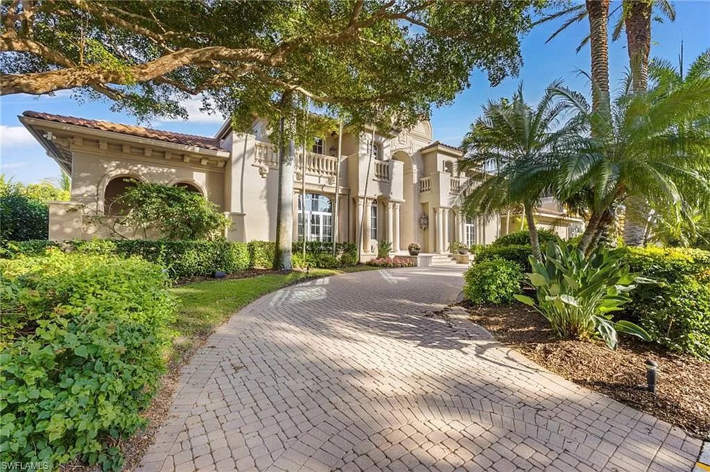 Welcome to the epitome of luxury living at 7310 Tilden Ln in Bay Colony Shores, Naples, Florida. This magnificent estate boasts over 10,000 square feet of meticulously crafted living space, featuring 6 palatial bedrooms with en-suite bathrooms, two additional half baths, and exquisite architectural details throughout.