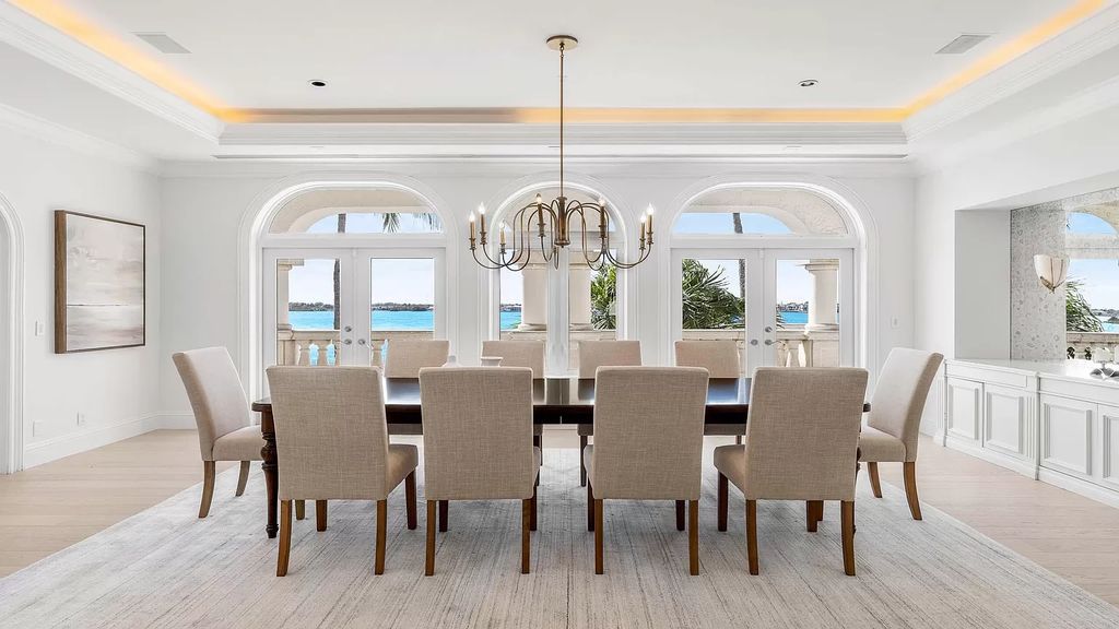 Discover an unparalleled opportunity in South Florida with this magnificent estate boasting nearly 4 acres of prime coastline, featuring 350 feet of direct Intracoastal waterfrontage and an additional 350 feet of direct oceanfrontage.