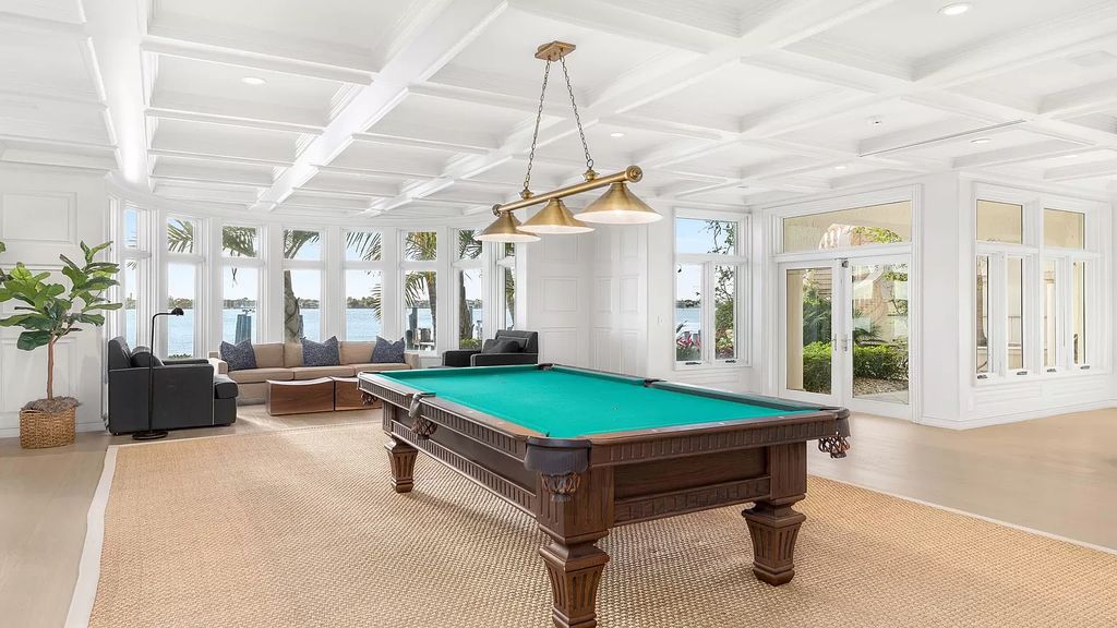 Discover an unparalleled opportunity in South Florida with this magnificent estate boasting nearly 4 acres of prime coastline, featuring 350 feet of direct Intracoastal waterfrontage and an additional 350 feet of direct oceanfrontage.