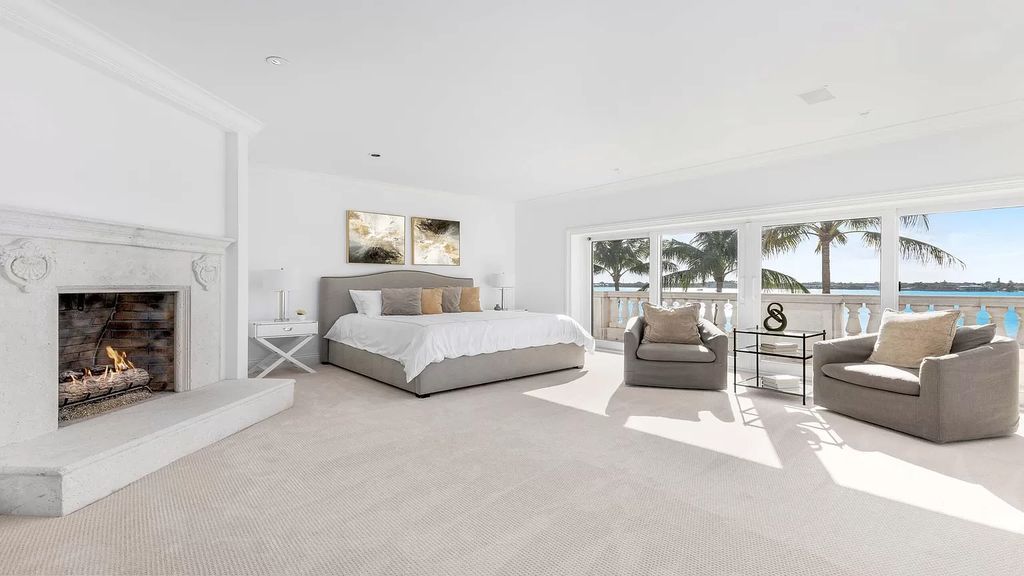 Discover an unparalleled opportunity in South Florida with this magnificent estate boasting nearly 4 acres of prime coastline, featuring 350 feet of direct Intracoastal waterfrontage and an additional 350 feet of direct oceanfrontage.